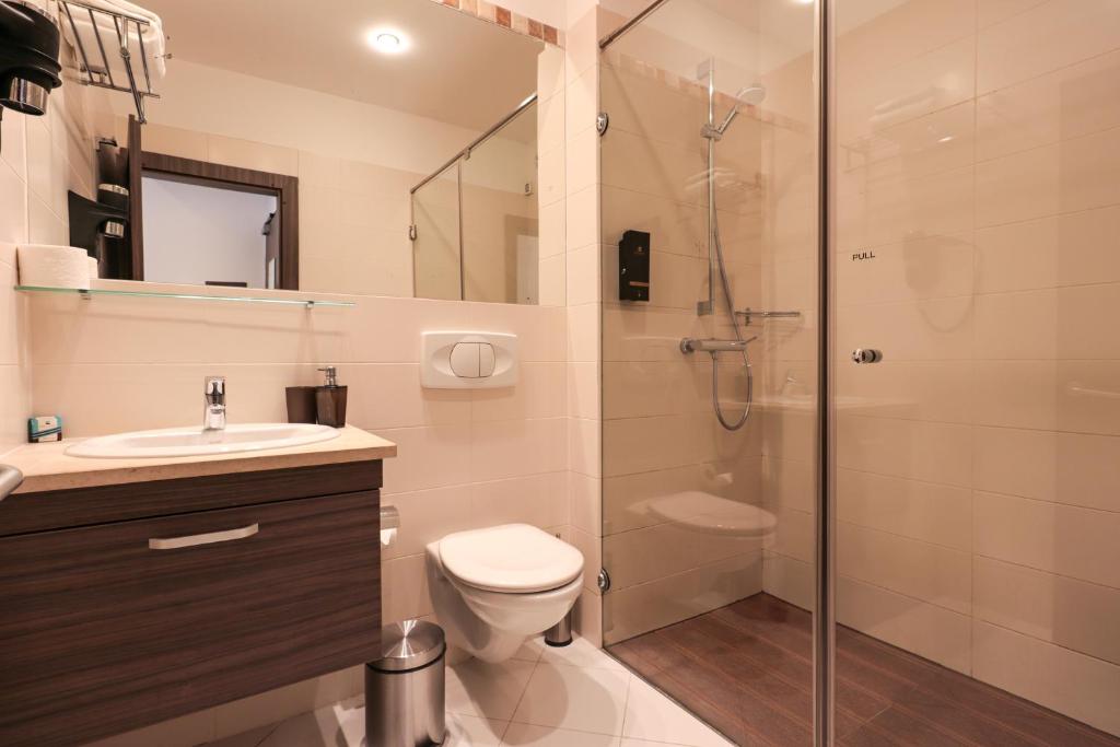 Koupelna v ubytování Hotel Nartel