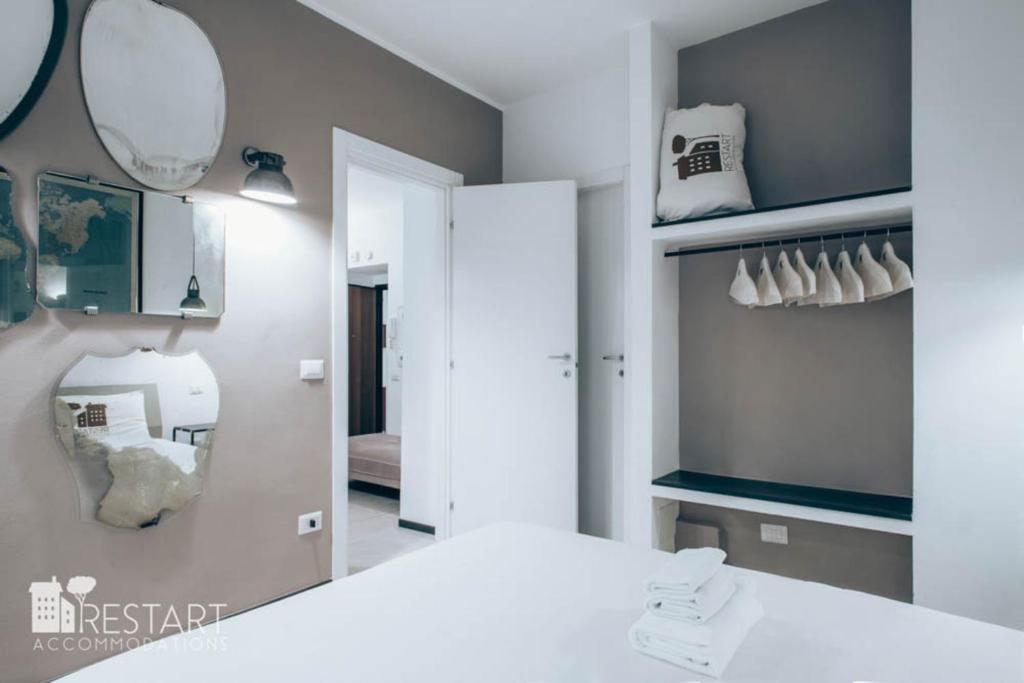 Posteľ alebo postele v izbe v ubytovaní Restart Accommodations Aldobrandini e Sciarra
