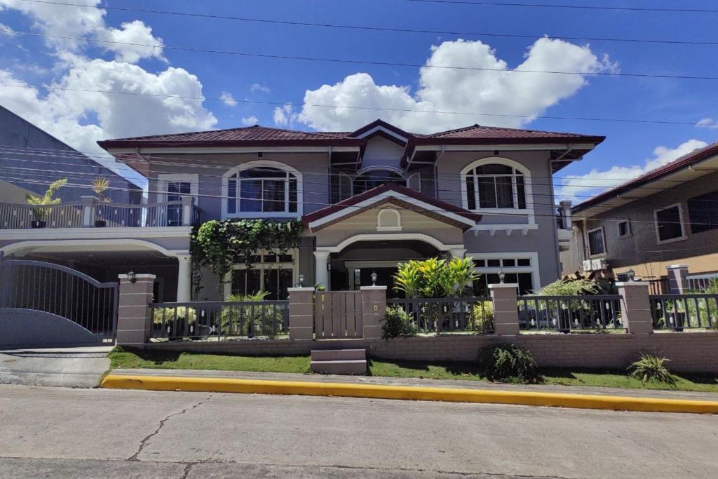 a house on the side of a street at Tampus Staycation Rental Cebu in Bulacao