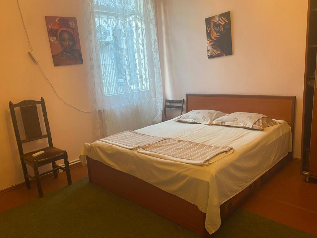 Postel nebo postele na pokoji v ubytování ALEXANDRE’s House