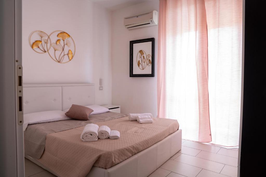 Postel nebo postele na pokoji v ubytování Eulalia Bnb Alghero