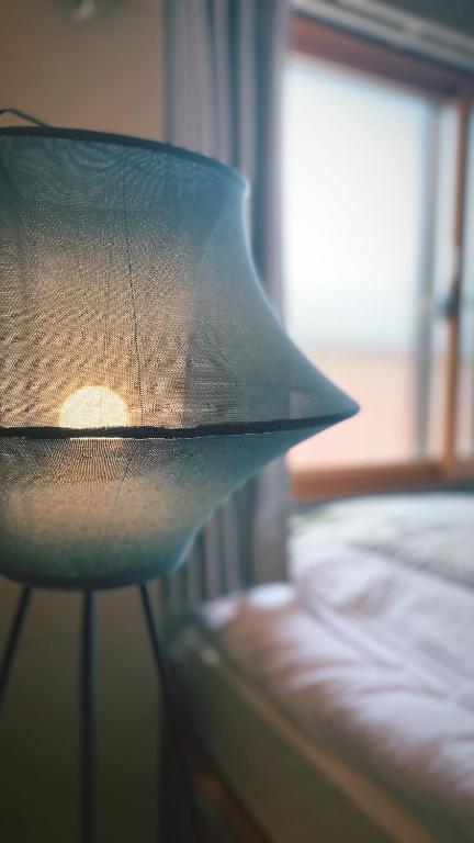 Cama o camas de una habitación en 民泊宿 i s e s h i m a 伊勢内宮前203