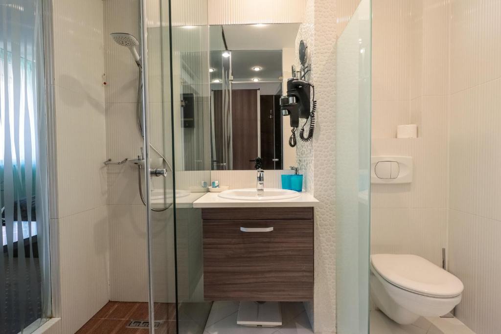 Koupelna v ubytování Hotel Nartel