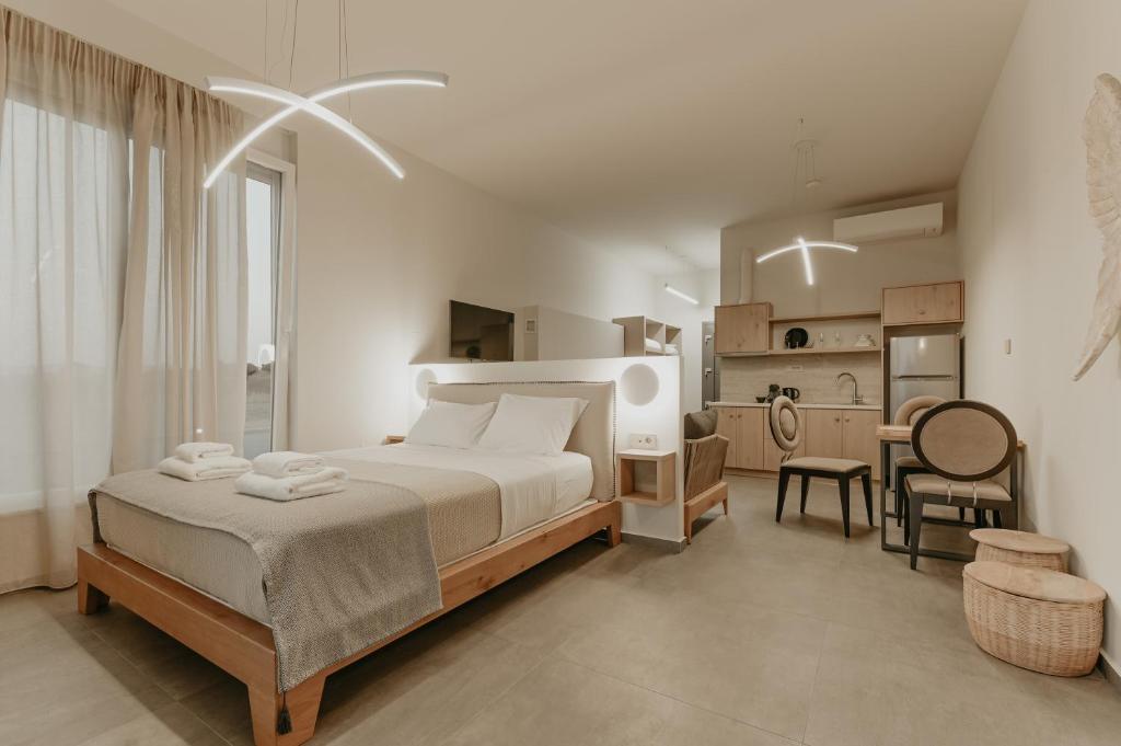 Postel nebo postele na pokoji v ubytování ALS COMFORT SUITES