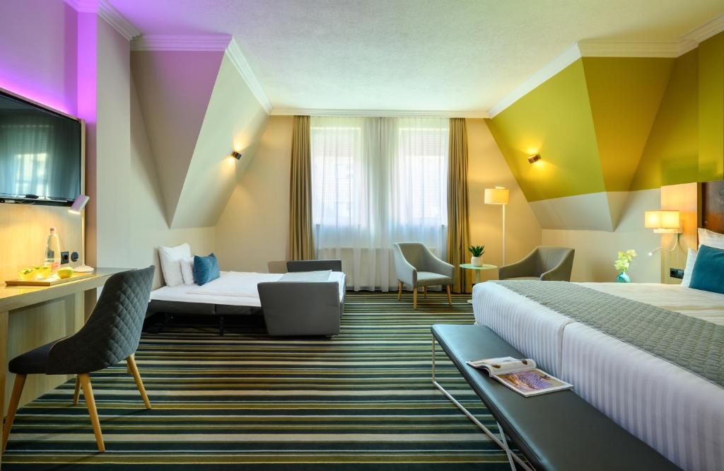 Posezení v ubytování Leonardo Hotel Budapest
