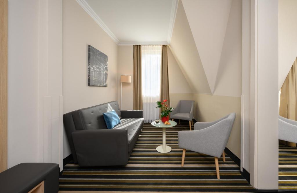 Posezení v ubytování Leonardo Hotel Budapest