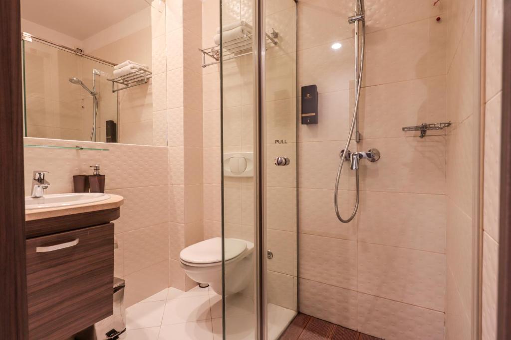 Koupelna v ubytování Hotel Nartel