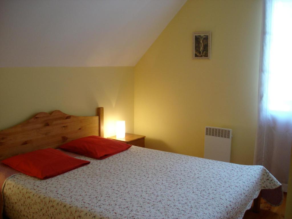 Postel nebo postele na pokoji v ubytování Le Clos de la Bergerie by CamiLodge