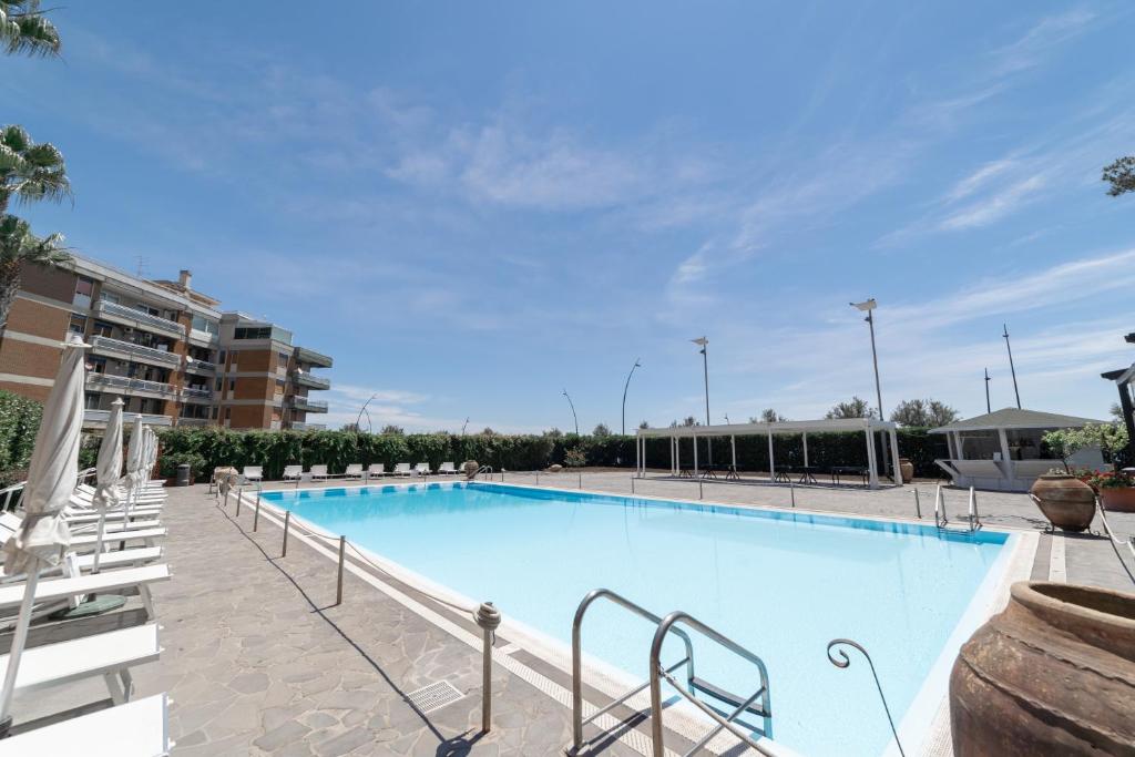 Bazén v ubytování Hotel Nettuno nebo v jeho okolí