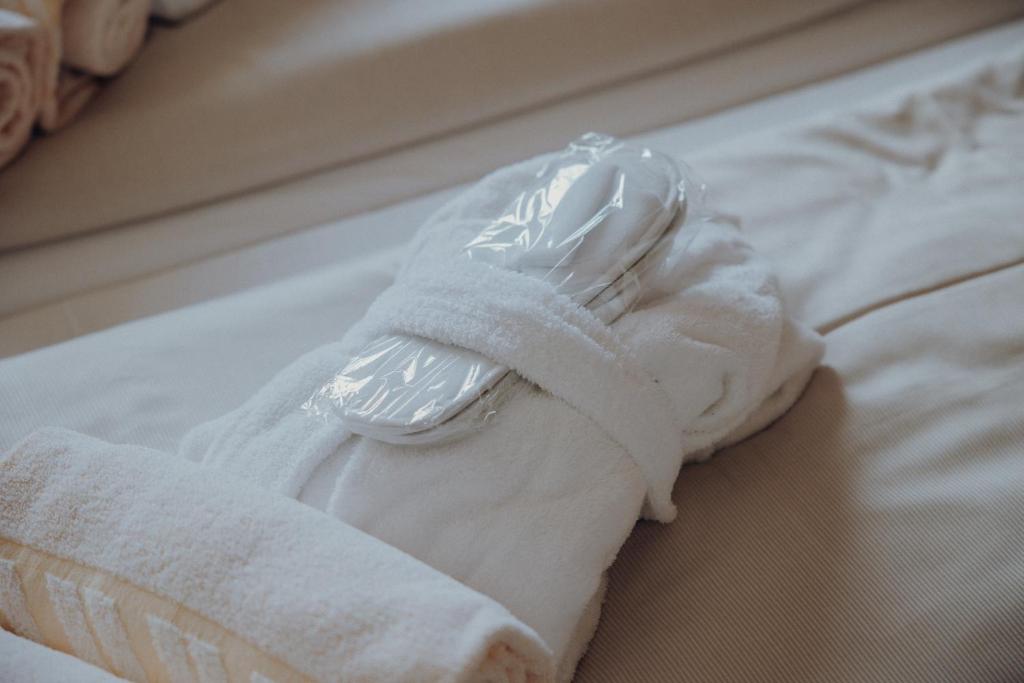Postel nebo postele na pokoji v ubytování Alpenhotel Kaiserfels