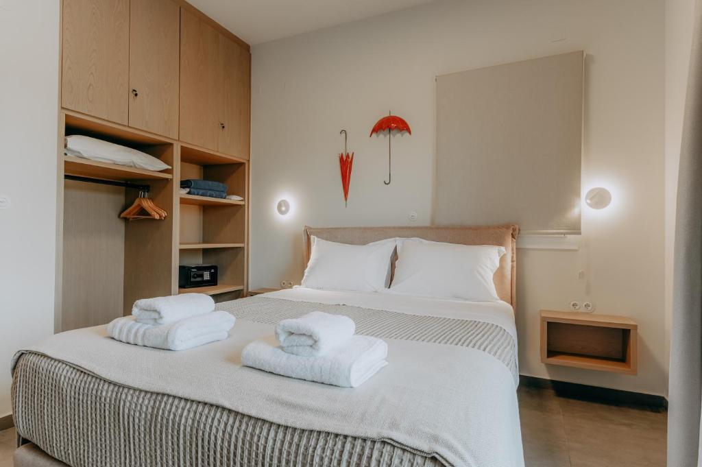 Postel nebo postele na pokoji v ubytování ALS COMFORT SUITES
