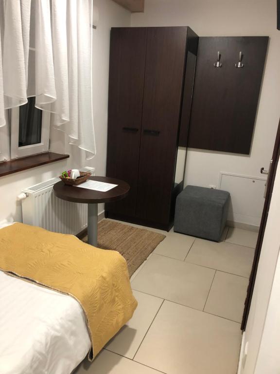 Posteľ alebo postele v izbe v ubytovaní Apartamenty Wakacyjna Wioska Ngô 20m od Suntago