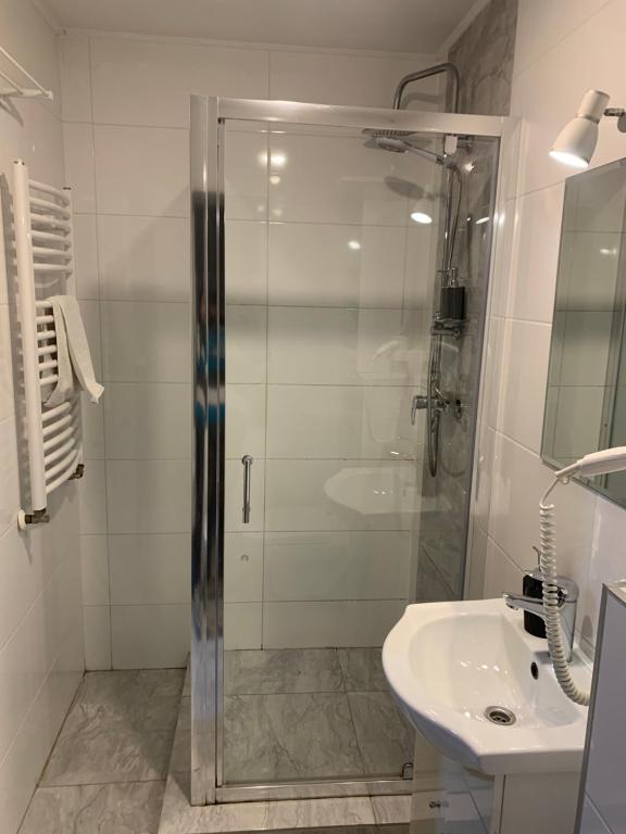Kúpeľňa v ubytovaní Apartamenty Wakacyjna Wioska Ngô 20m od Suntago