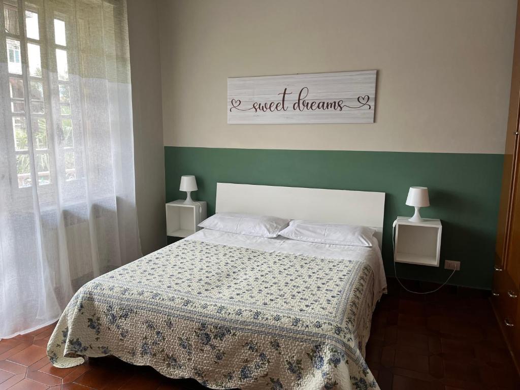 Postel nebo postele na pokoji v ubytování L’ulivo
