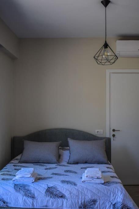 Postel nebo postele na pokoji v ubytování 'Casa NiMa'