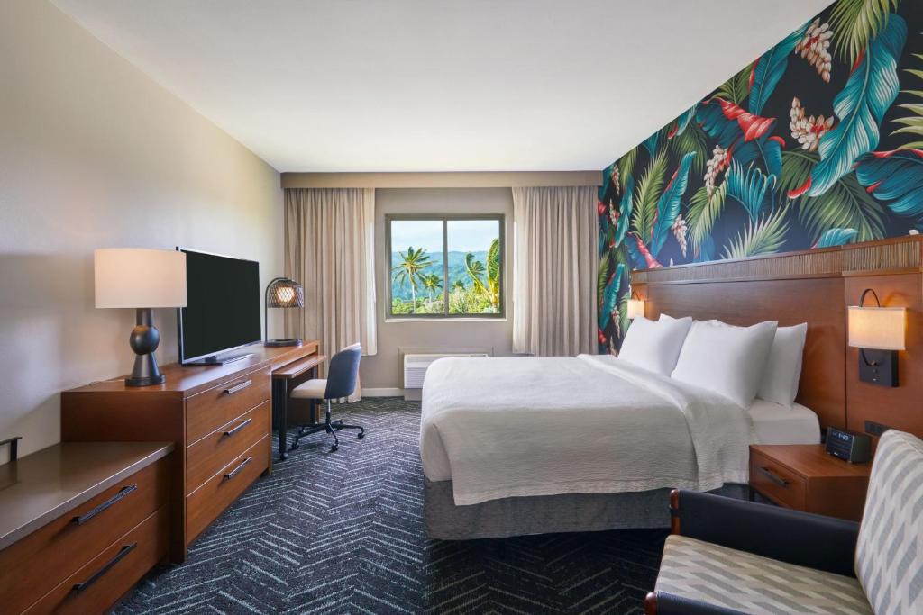 Cama ou camas em um quarto em Courtyard by Marriott Oahu North Shore