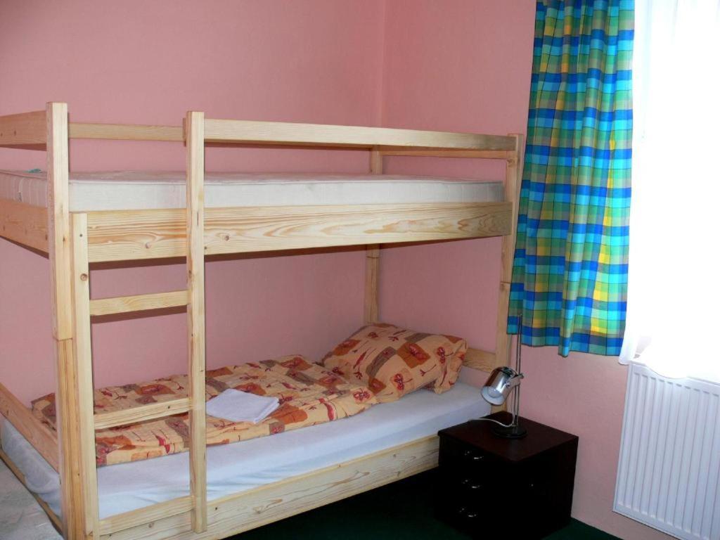 Postel nebo postele na pokoji v ubytování Penzion Neco