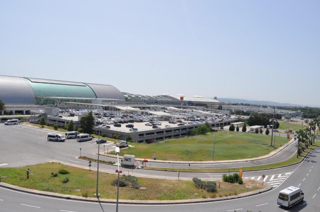 an aerial view of a parking lot with cars parked at Orty Airport Hotel in Izmir