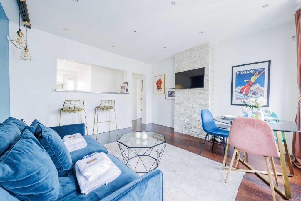 Et tv og/eller underholdning på Charming 4P apartment Saint Mande