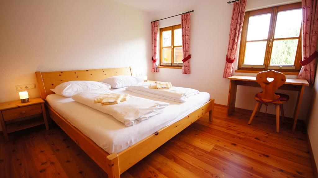 Postel nebo postele na pokoji v ubytování Chalet Lisa