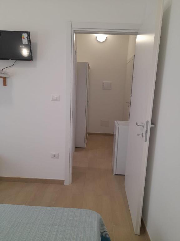 Postel nebo postele na pokoji v ubytování Beach Rooms 1 Self Check-in