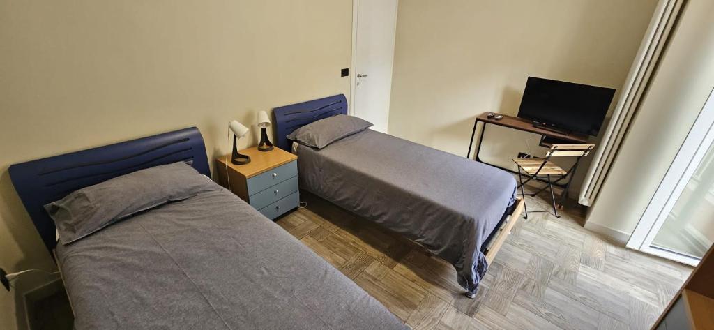 Postel nebo postele na pokoji v ubytování B&B Via Roma