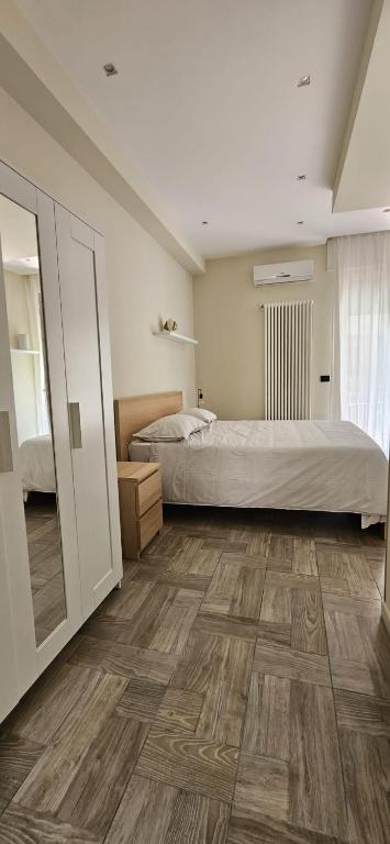 Postel nebo postele na pokoji v ubytování B&B Via Roma