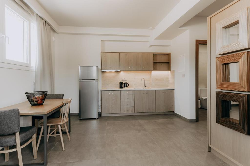 Kuchyň nebo kuchyňský kout v ubytování ALS COMFORT SUITES