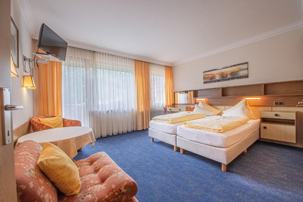Postel nebo postele na pokoji v ubytování Haus Anni