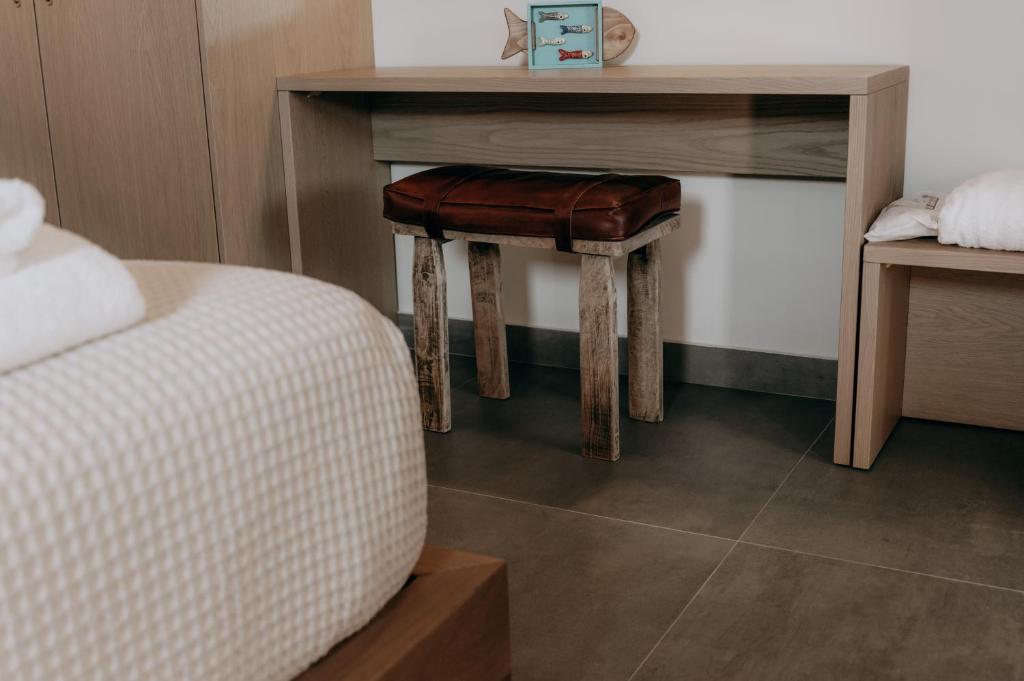 Postel nebo postele na pokoji v ubytování ALS COMFORT SUITES