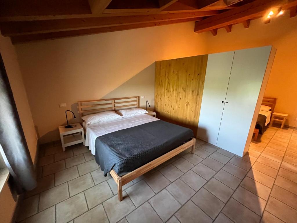 Posteľ alebo postele v izbe v ubytovaní Agriturismo il Fontanile