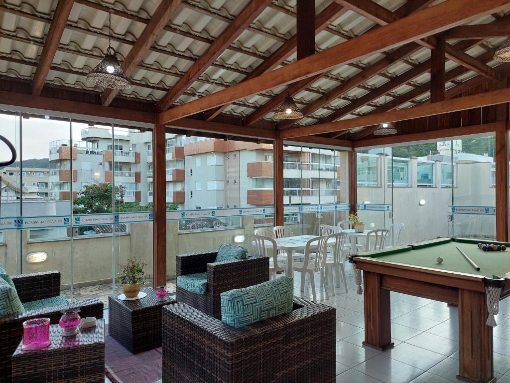 Uma área de estar em Bombinhas Praia Apart Hotel - unidade rua Bem Te Vi