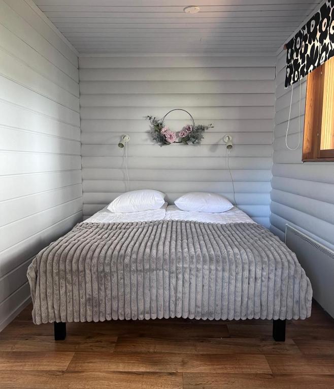 Postel nebo postele na pokoji v ubytování Jauri Resort