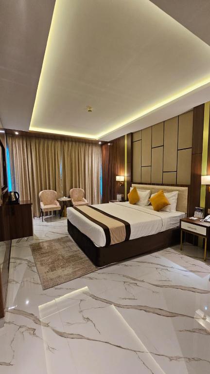 Postel nebo postele na pokoji v ubytování Concorde Deira Hotel -Formerly Golden Tulip Deira Hotel