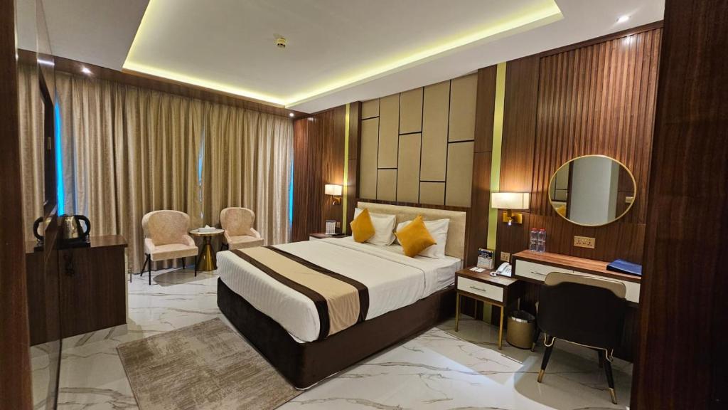 Postel nebo postele na pokoji v ubytování Concorde Deira Hotel -Formerly Golden Tulip Deira Hotel