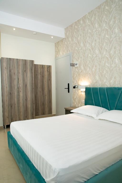 Postel nebo postele na pokoji v ubytování Alv Rent Rooms