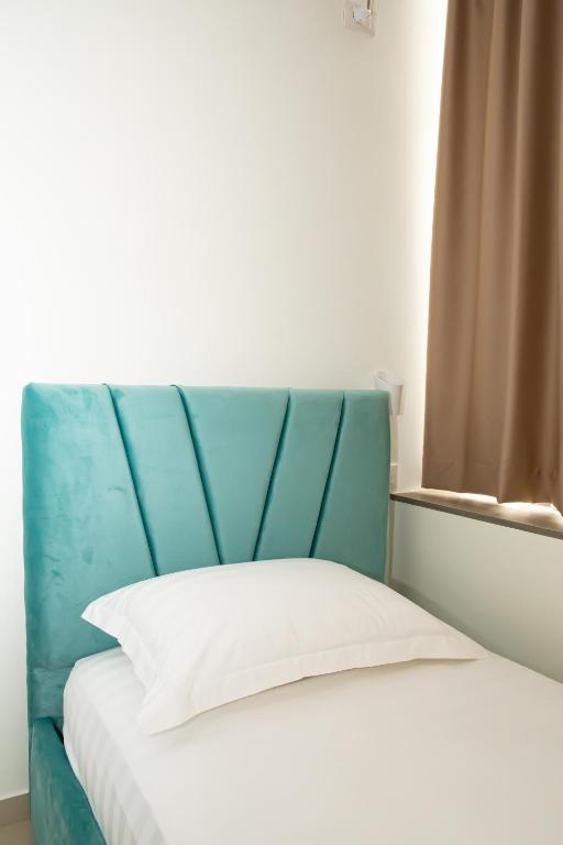 Postel nebo postele na pokoji v ubytování Alv Rent Rooms