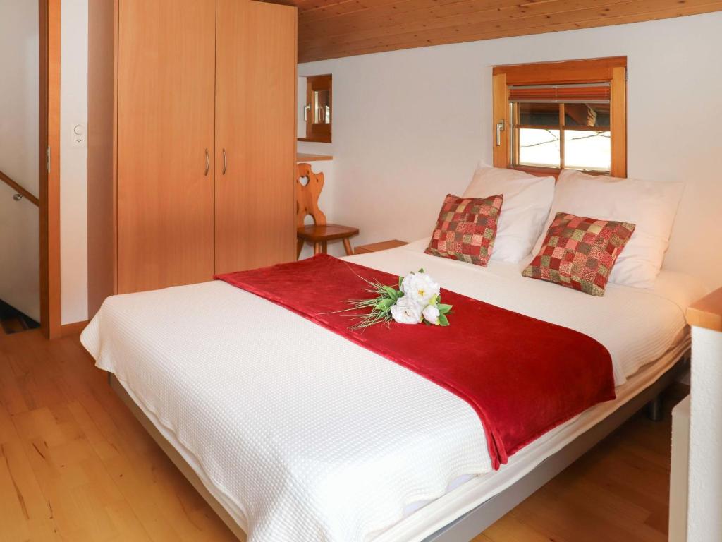 En eller flere senger på et rom på Holiday Home Gädi by Interhome