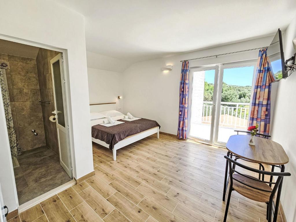 Posteľ alebo postele v izbe v ubytovaní Apartment Balota - Moreška-4 by Interhome