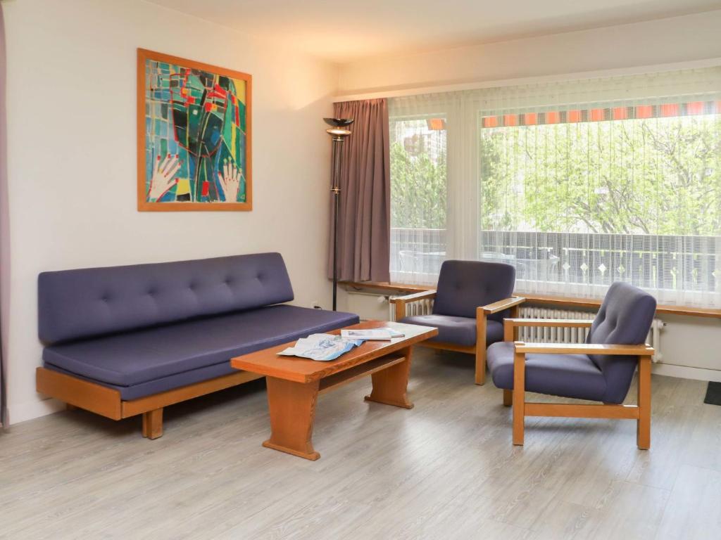 Posezení v ubytování Apartment Matten - Utoring-13 by Interhome