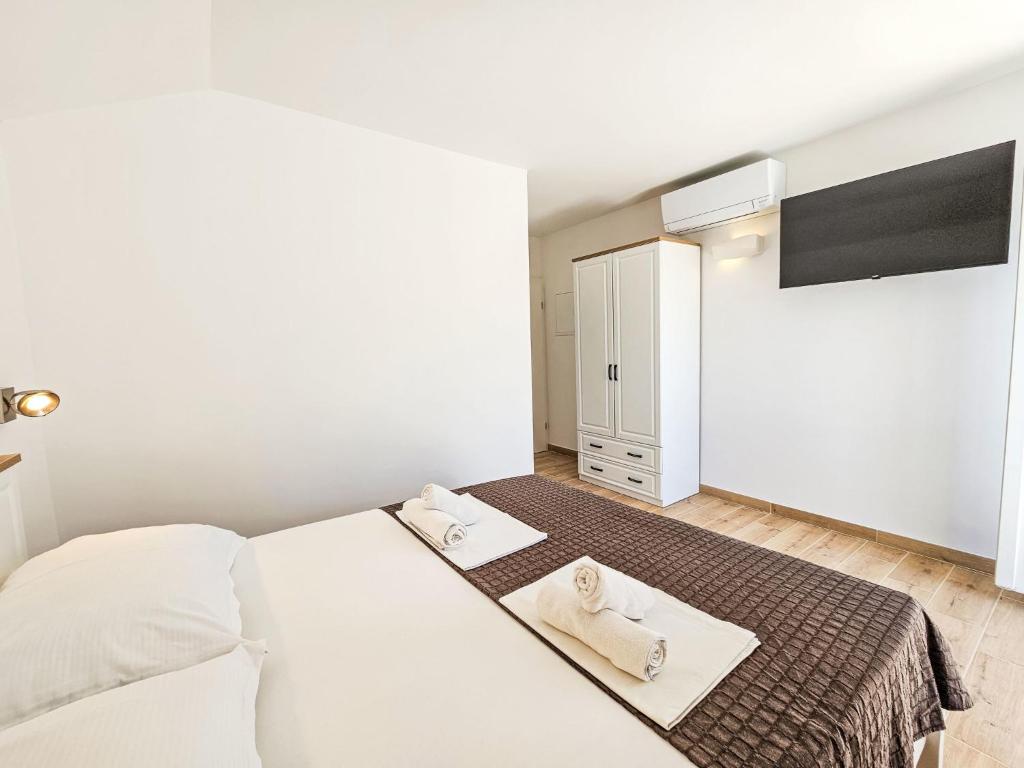 Posteľ alebo postele v izbe v ubytovaní Apartment Balota - Moreška-4 by Interhome