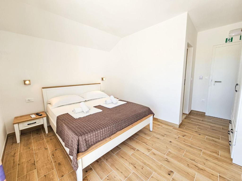 Posteľ alebo postele v izbe v ubytovaní Apartment Balota - Moreška-4 by Interhome
