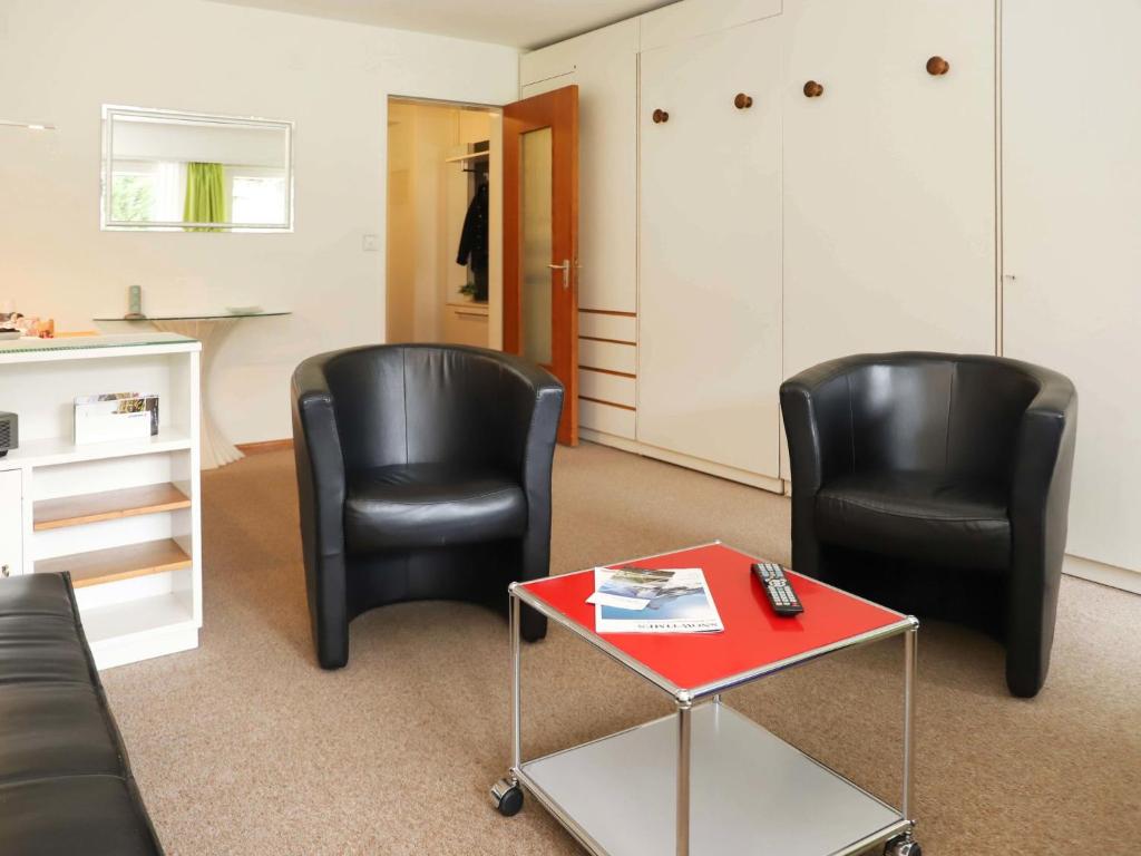 Posezení v ubytování Apartment Matten - Utoring-12 by Interhome
