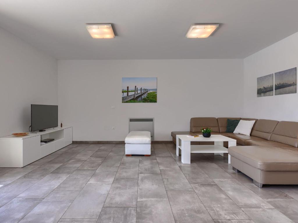 Telewizja i/lub zestaw kina domowego w obiekcie Villa Luna Rossa by Interhome