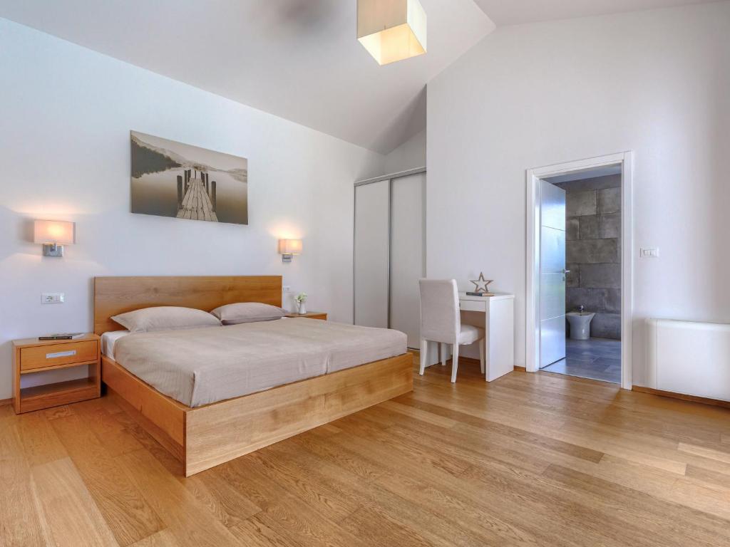 Łóżko lub łóżka w pokoju w obiekcie Villa Luna Rossa by Interhome