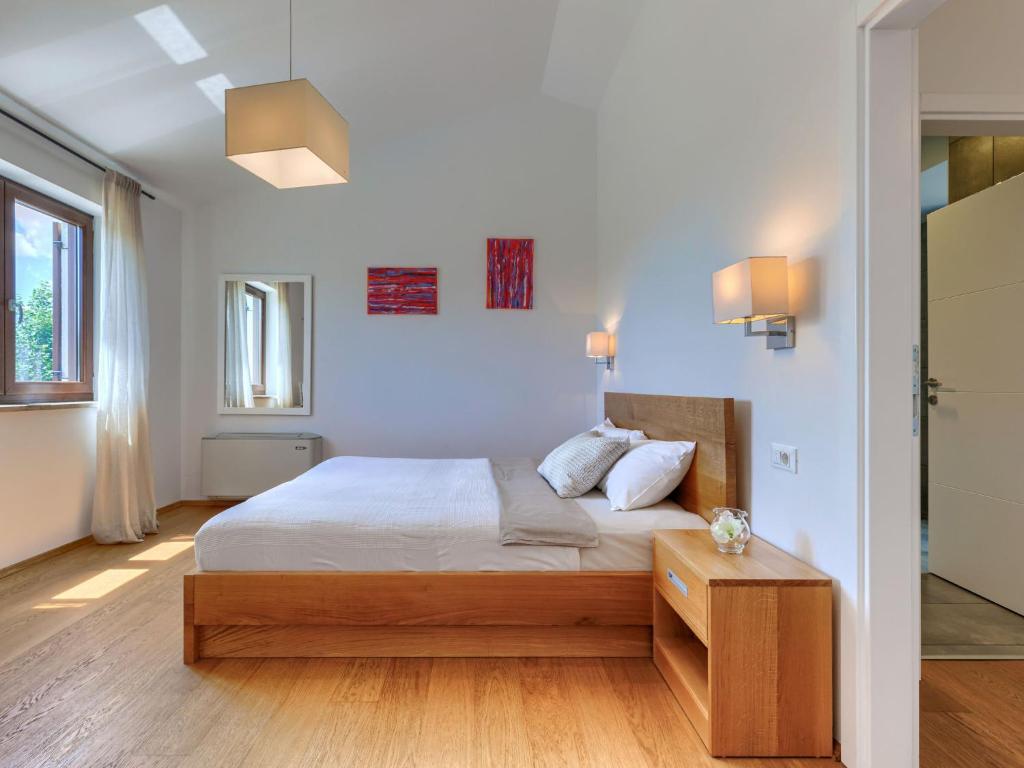 Łóżko lub łóżka w pokoju w obiekcie Villa Luna Rossa by Interhome