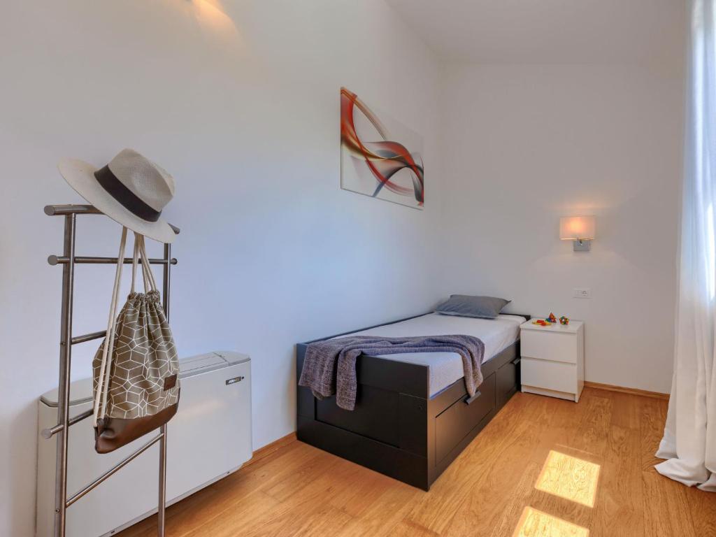 Łóżko lub łóżka w pokoju w obiekcie Villa Luna Rossa by Interhome