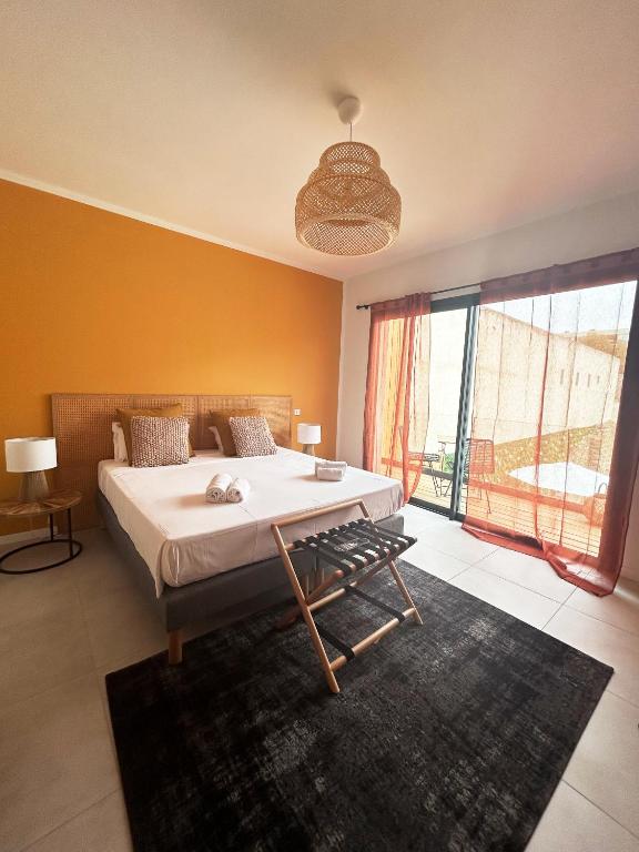 Postel nebo postele na pokoji v ubytování Hôtel A Stretta