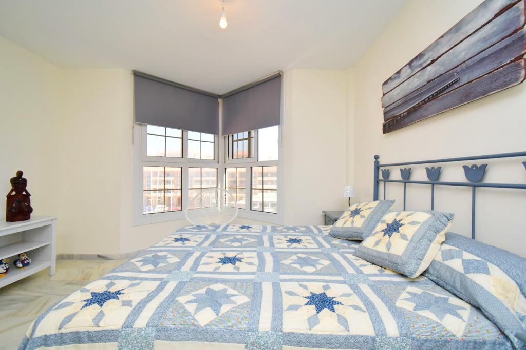 Katil atau katil-katil dalam bilik di Expoholidays - MAGNIFICO APARTAMENTO CON VISTAS AL PUERTO