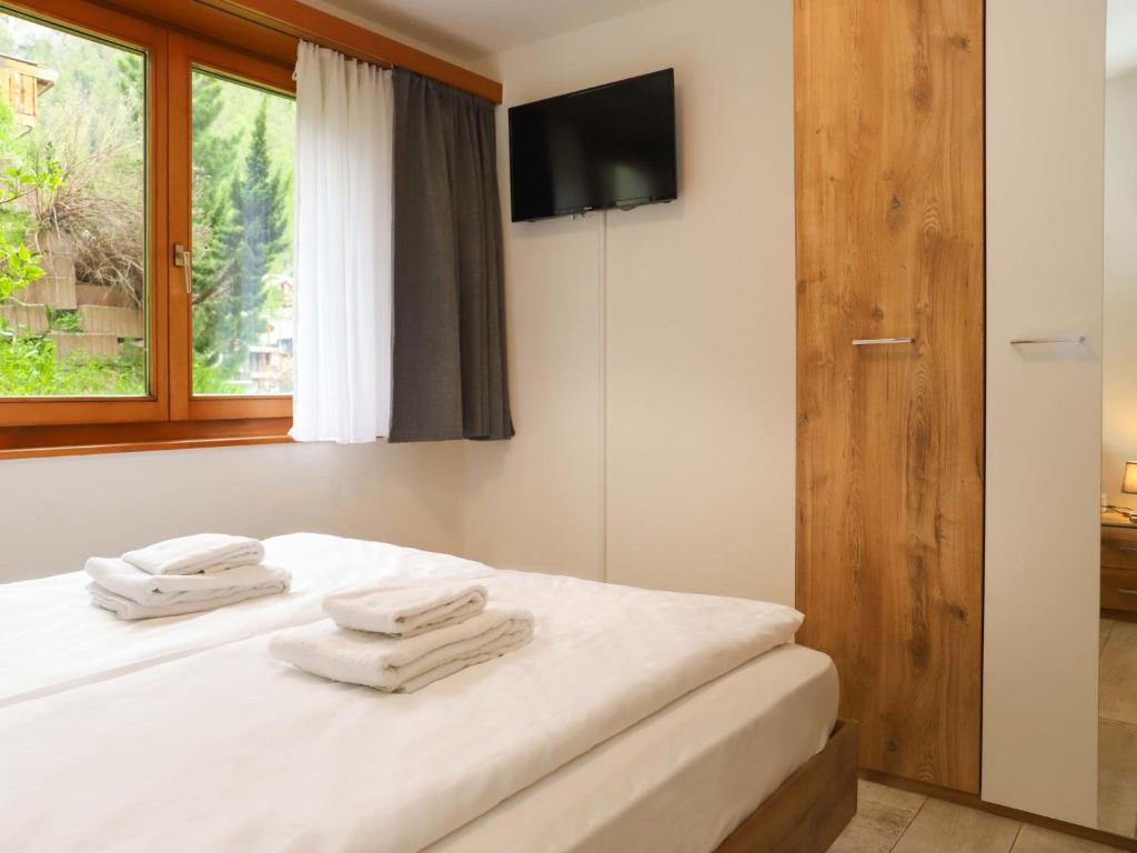 Postel nebo postele na pokoji v ubytování Apartment Nirwana by Interhome